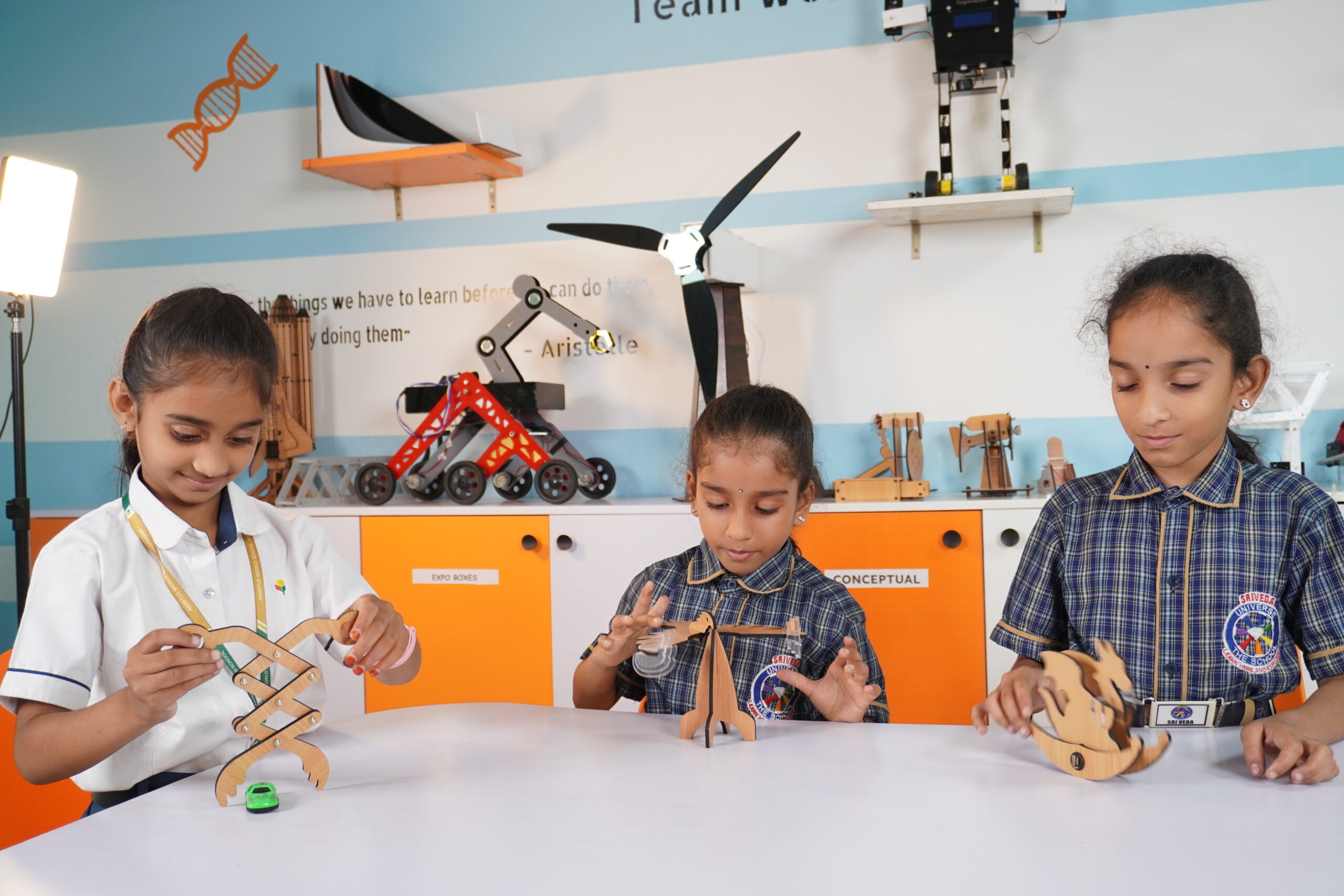 Students assembling a STEM model